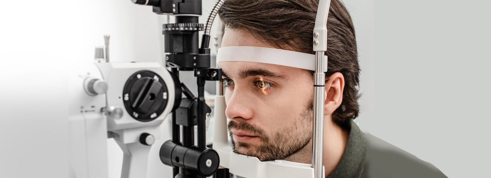 young man during eye exam in Aurora